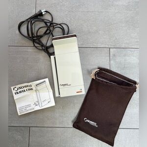 Norelco Travel Garment Steamer - compact & easy to use. Trip or even dorm use! 😎